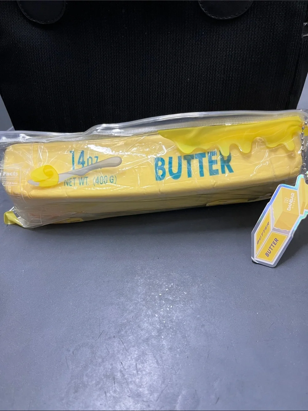 NWT Yellow 'Butter' Novelty 14 Oz Squishy Sensory Stress Toy in zipper pouch